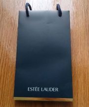 メガネ、香水、化粧ポーチ、エスティーローダーの画像