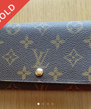 茶色折りたたみ財布の画像