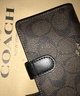 茶色 2つ折り COACH 財布の画像