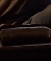 偽ルイヴィトンの茶の折り畳み財布の画像