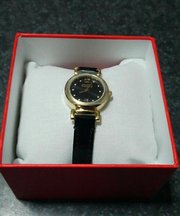 COACH、黒の時計の画像