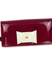 vivienne westwood の白いリボンが付いた赤い長財布の画像