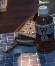 薄ピンクの三つ折り財布の画像