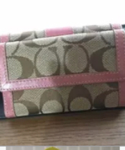 コーチ シグネチャー柄 コンパクト財布の画像