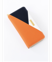 オレンジと白の長財布の画像