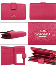 COACH　ピンク折り畳み財布の画像