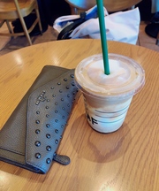  コーチ 長財布 茶色の画像