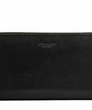 黒い革製、コーチの長財布の画像