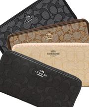 COACHの財布 縁は黒 表面は茶色の画像