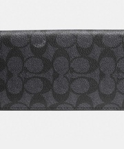 黒いcoachの長財布の画像