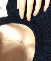 ピンクゴールドのネックレス、リボンモチーフの画像