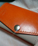 オレンジ色のabrasusの財布を落としましたの画像