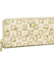 COACH長財布ゴールドの画像