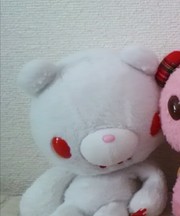 ぬいぐるみ２つ入った青い手提げの画像