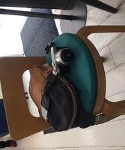 バッグと手帳、カメラの画像